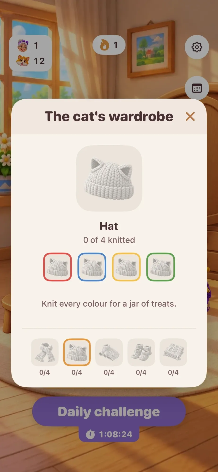 The cat's wardrobe showing a knitted hat with cat ears, to be knitted in four colours.